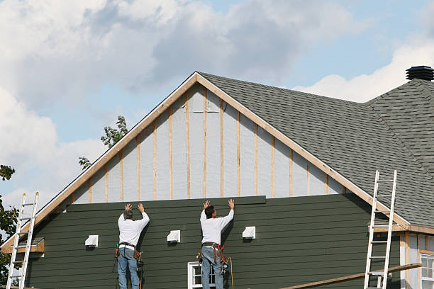 Professional Storm Damage Siding Repair technician working in Conover, NC